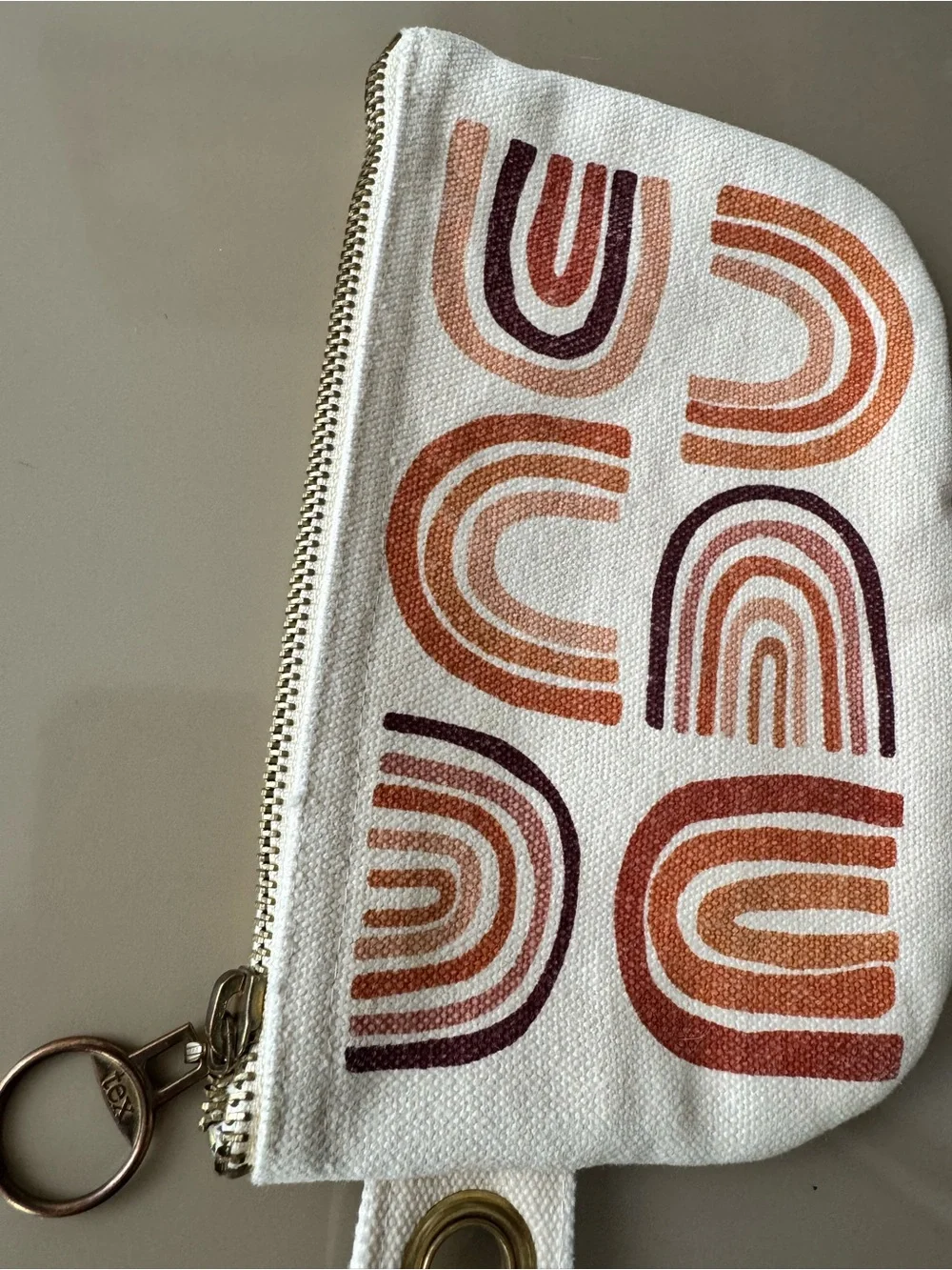 Danica Studio canvas zip pouch with terracotta rainbow screen-print design